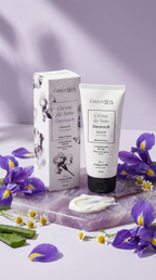 Crème de Soin DermoLift Green Spa avec son étui et des fleurs d’iris
